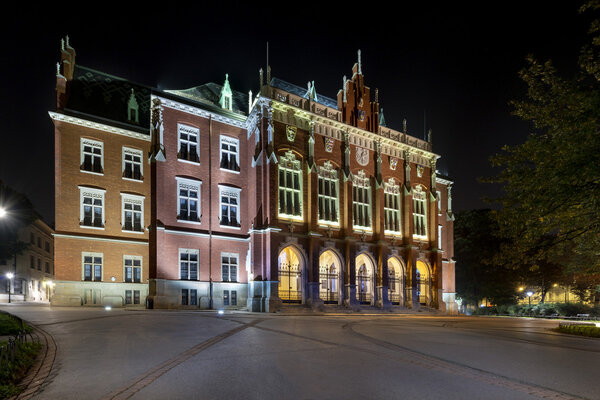 Old university building - Collegium Novum in Krakow at night