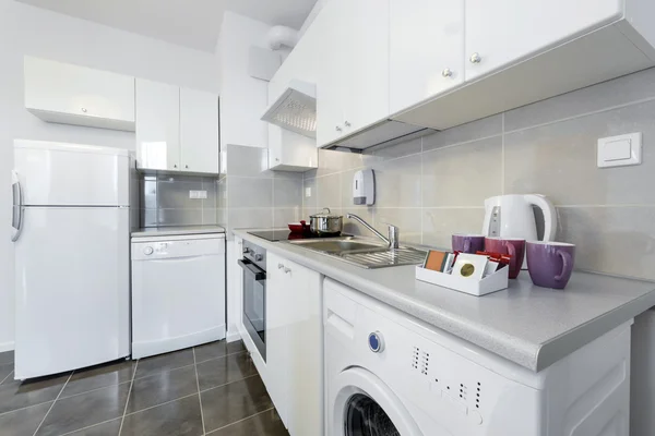 Modern kitchen interior design in white color — Stock Photo, Image