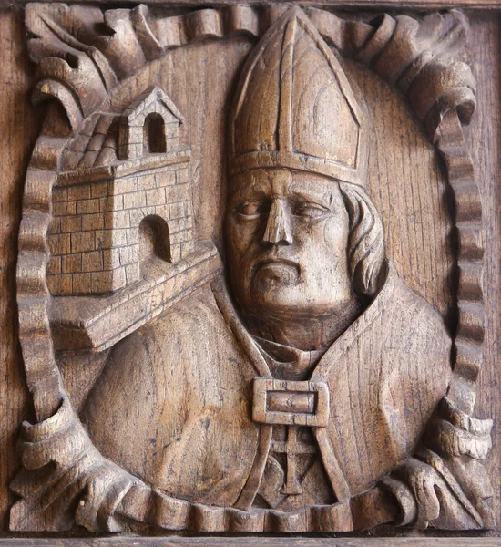 Дерев'яної гравюри єпископа на головних дверей собору Tui, — стокове фото