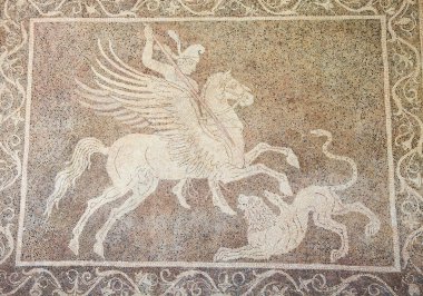 Mozaic of a horseman fighting a lion in Rhodes, Greece