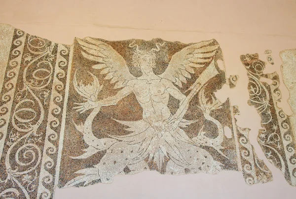 Mozaic of a mythological creature at the Archeological Museum in — Stockfoto