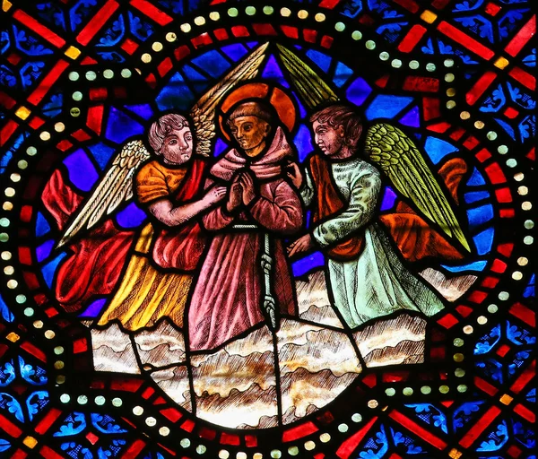 Vitrail d'un saint catholique et des anges dans la cathédrale de Léon — Photo