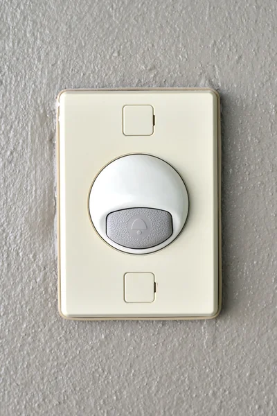 Bouton d'interrupteur cloche sur le mur — Photo