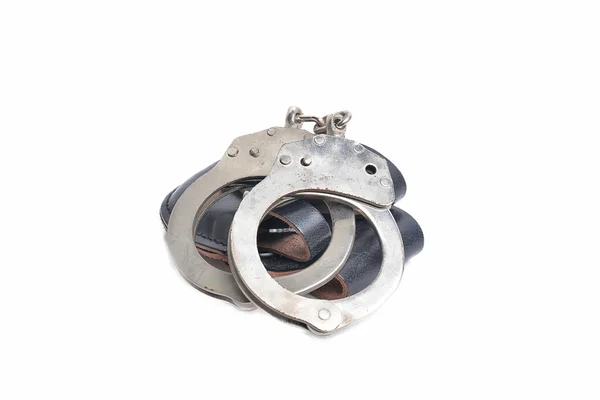 Handcuffs isolated in white — Stock Photo, Image