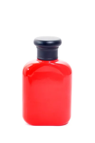 Die Flasche rote Farbverpackung isoliert auf weißem Hintergrund — Stockfoto