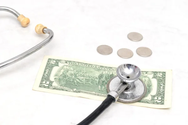 Stethoscope and dollar — Stock Photo, Image