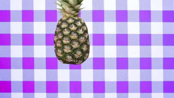 Falling ripe, juicy, healthy fruits on a checkered purple tablecloth. Gradually fill the frame. Healthy food concept. Design presentation, letterhead, cutoff — Stock Video
