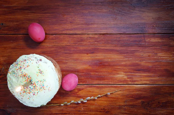 Composition about Orthodox Christian Easter with red eggs and a cake