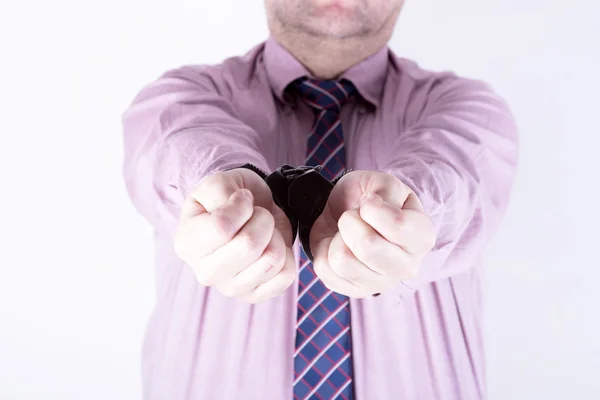 Elegant businessman in handcuffs — Stock Photo, Image