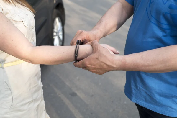 The arrest of a young woman — Stock Photo, Image