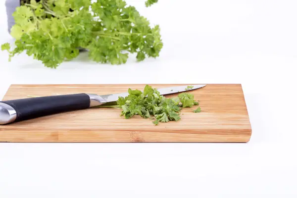 Parsley on a chopping board cookery — Stock Photo, Image