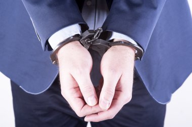 kelepçeli zarif işadamı