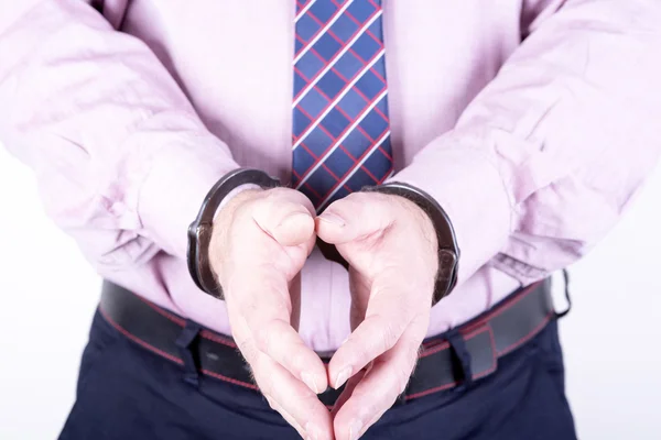 Elegant businessman in handcuffs — Stock Photo, Image