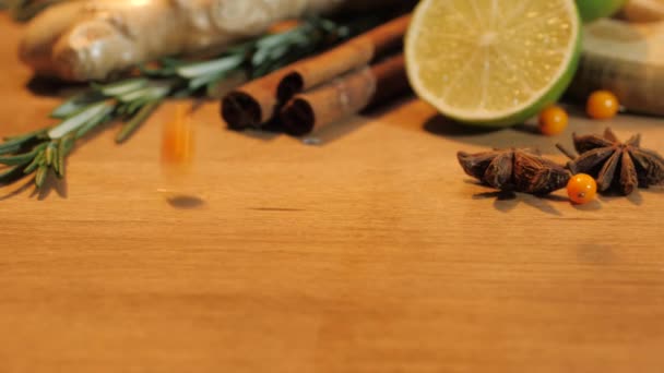 Fresh lime,sea buckthorn, ginger. Background with spices. ingredients for tea. Spices Flying and Falling Slow Motion. — Stock Video