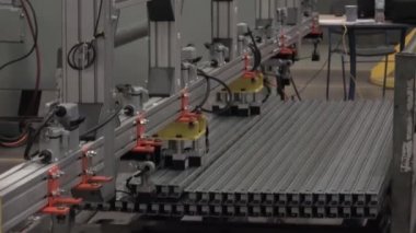 Robotic Equipment. Automated Machine. Modern Commercial mass production. industrial production. Conveyor Belt on the Industrial Factory.