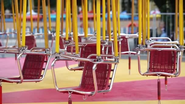 Empty carousel swings — Stock Video