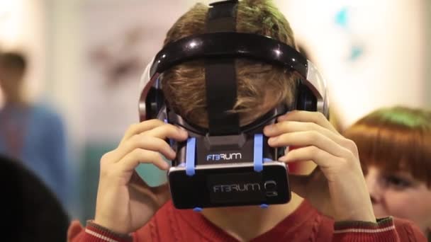 Virtual reality game. Young man playing with virtual reality glasses — Stock Video