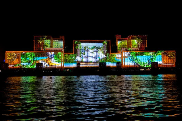 International Festival Circle of Light. Laser video mapping show on facade of the Ministry of Defense in Moscow, Russia — Stock Photo, Image