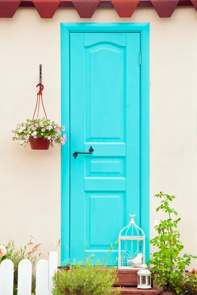 Aqua color door entrance to the house — Stock Photo, Image