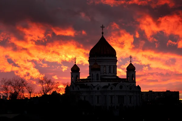 Dramatic sunset with cathedral silhouette view — Stock Photo, Image