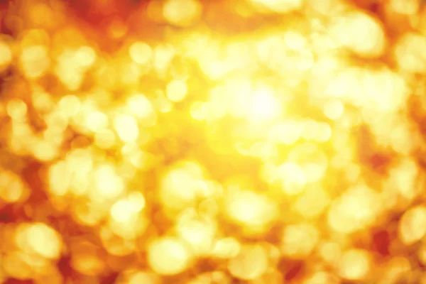 Shining defocused highlights in gold and yellow — Stock Photo, Image