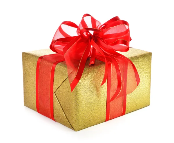 Isolated gold gift box with red bow — Stock Photo, Image