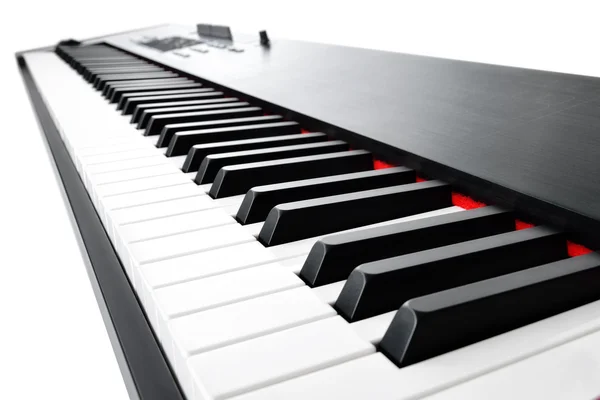 Hudební klávesnice na bílém pozadí — Stock fotografie