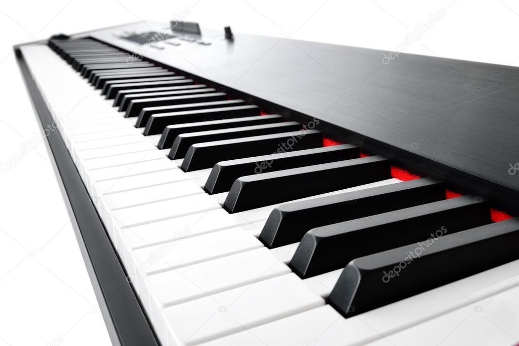 Musical keyboard on white