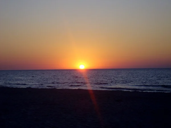 Günbatımı plaj su hava dalgalar deniz kum güneş