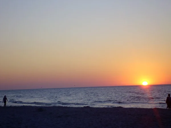 Günbatımı plaj su hava dalgalar deniz kum güneş
