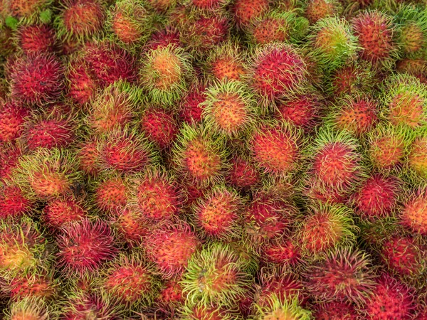 Rambutan doce delicioso fundo de frutas . — Fotografia de Stock