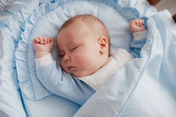 Baby sleeps with a cradle — Stock Photo, Image