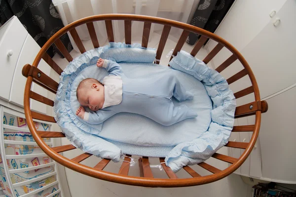 Baby sleeps with a cradle — Stock Photo, Image