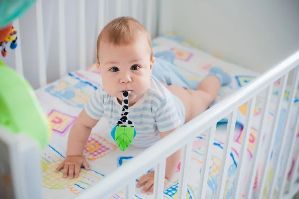 Baby in her crib — Stock Photo, Image