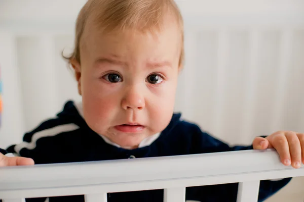 Baby crying in the crib — Stock Photo, Image