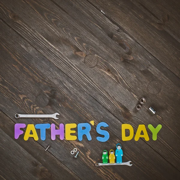 Litery i narzędzia drewniane tła ojców dzień — Zdjęcie stockowe
