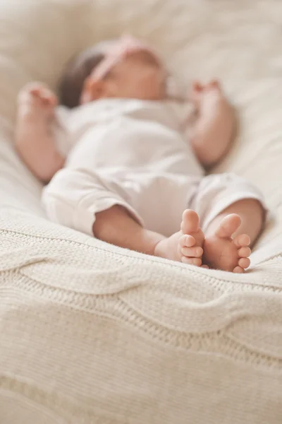 Leg sleeping newborn — Stock Photo, Image