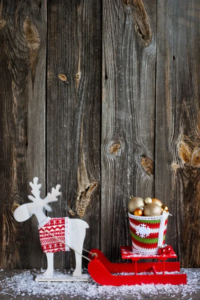 Christmas decoration over wooden background — Stock Photo, Image