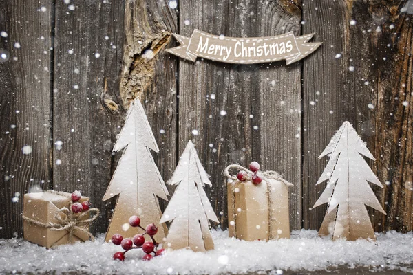 Christmas decoration over wooden background — Stock Photo, Image