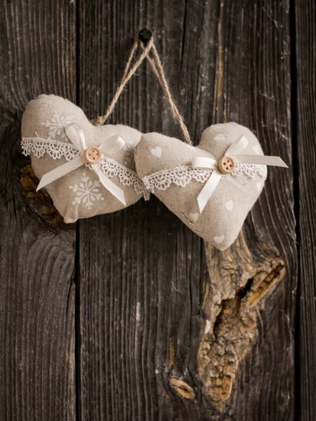 Wooden heart hanging on a branch — Stock Photo, Image