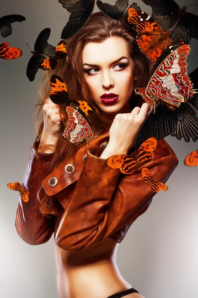 Woman in brown jacket — Stock Photo, Image