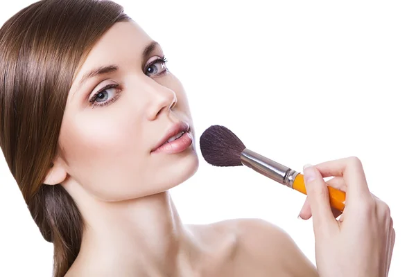 Natuurlijke sexy vrouw met cosmetische borstel Stockfoto