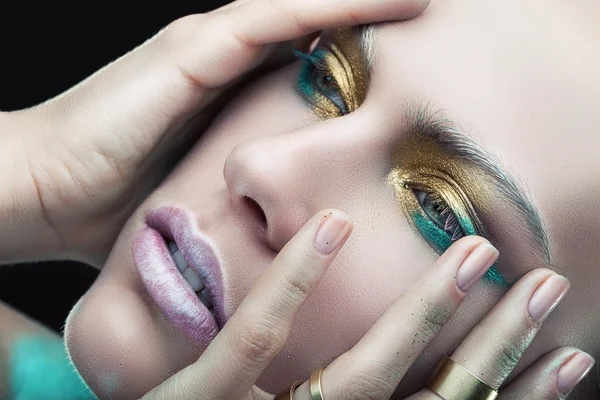 Woman with gold eye-shadow — Stock Photo, Image