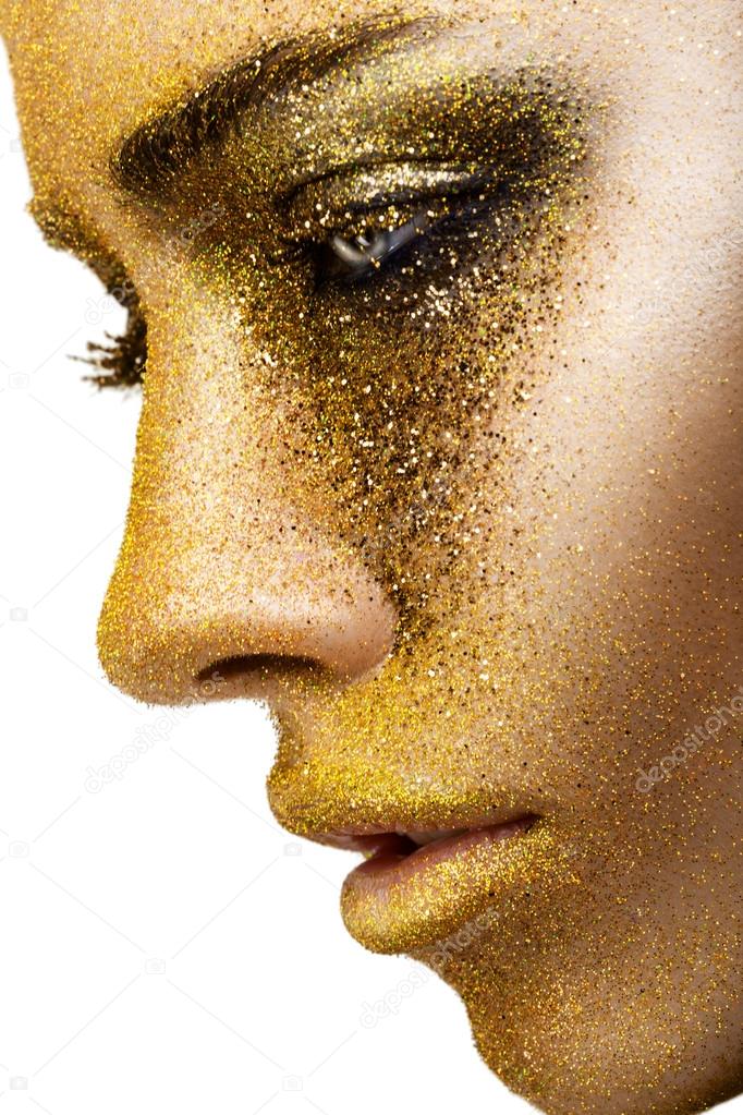 Woman with golden make-up