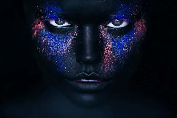 Girl in black paint — Stock Photo, Image