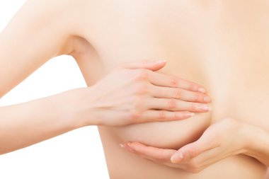 Göğüslerini tutan kadın