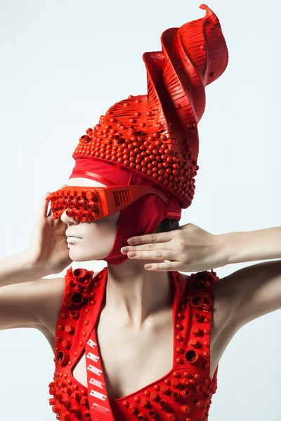 Woman in red hat and dress — Stock Photo, Image