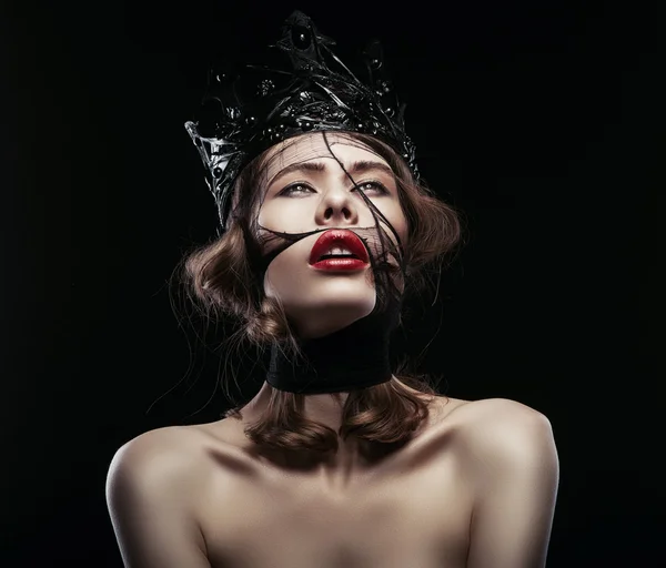 Pretty woman in dark crown — Stock Photo, Image