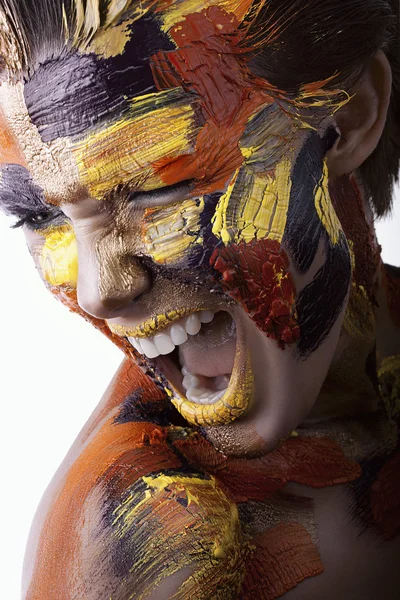 Woman with paint on face — Stock Photo, Image