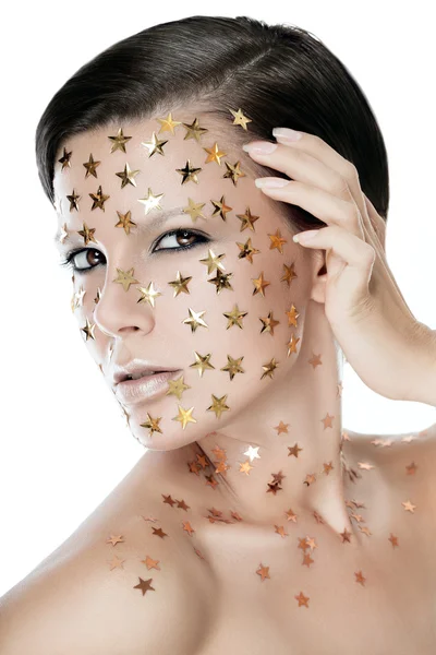 Mujer con estrellas en la cara — Foto de Stock